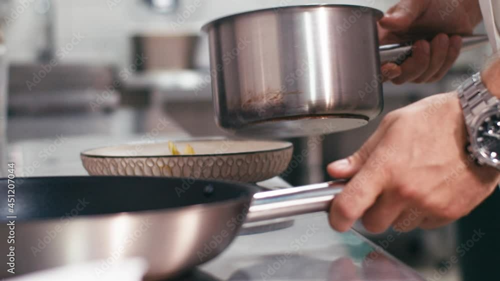 the chef takes a pot to prepare the dish the chef takes a pot to prepare the dish