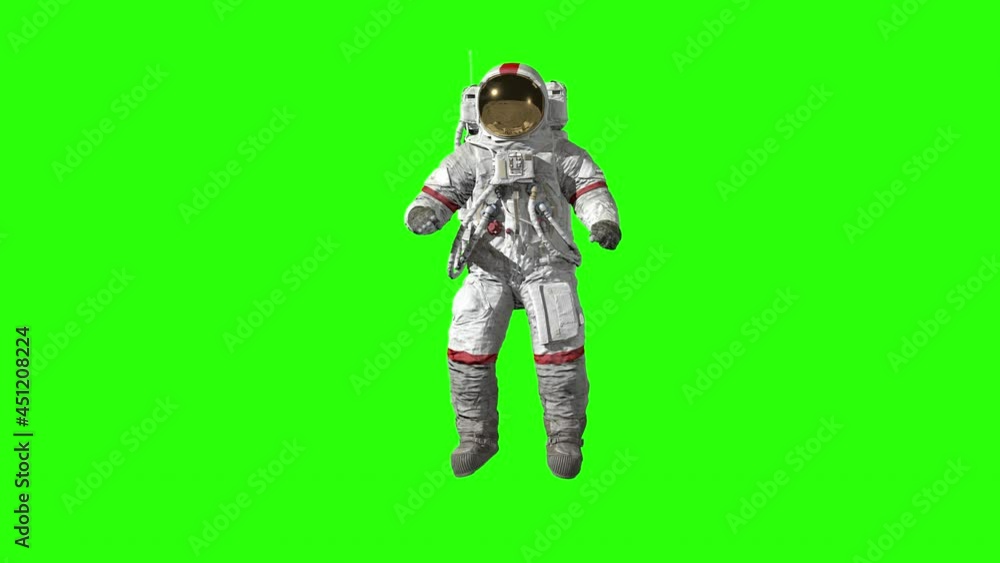 Astronaut jumping and saluting on green screen. Astronaut jumping and saluting on green screen.