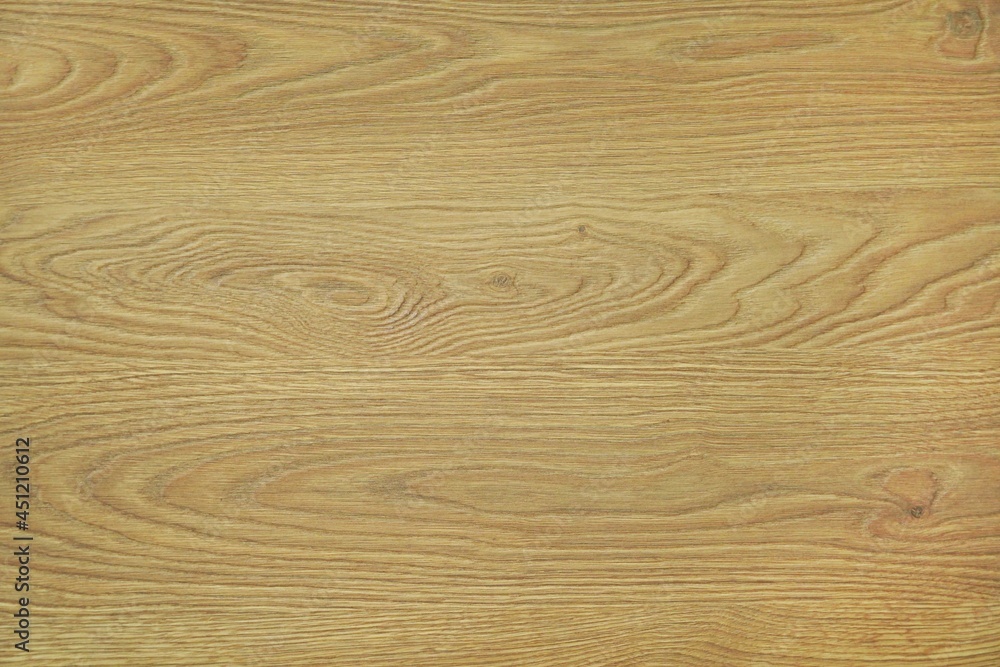 Fototapeta premium Brown veneer surface with wood grain as background for construction or decoration Use it as a background in art. It can also be used to lay ceramic tiles on walls and floors.