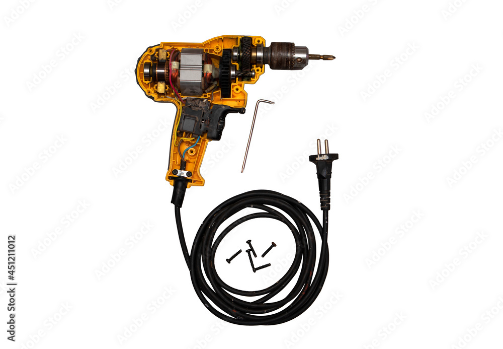 detachable used electric drill on white background The lid opens to reveal the internal components that include the motor, gear and switch. detachable used electric drill on white background The lid opens to reveal the internal components that include the motor, gear and switch.