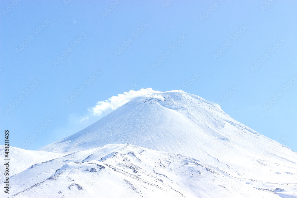 Kamchatka Peninsula. The top of the Avachinsky volcano in clear winter weather. The perfect weather for climbing. The natural park of Russia 