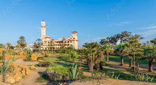 Day shot of Montaza public park with Royal palace and Palestine Hotel at far end, Alexandria, Egypt