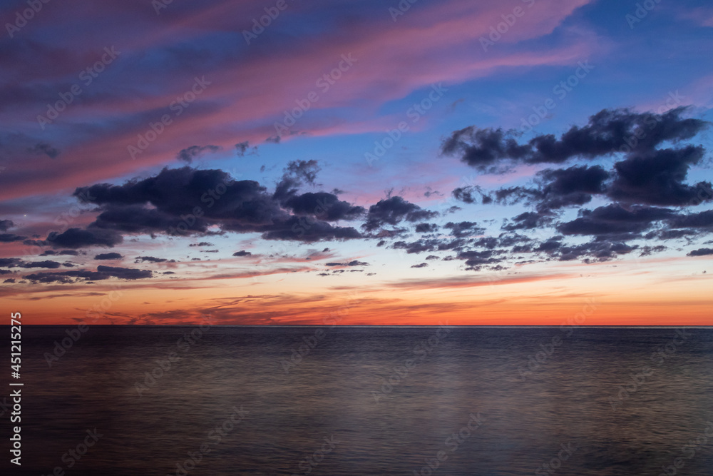 vibrant colors of a sunset sky over the great lakes 