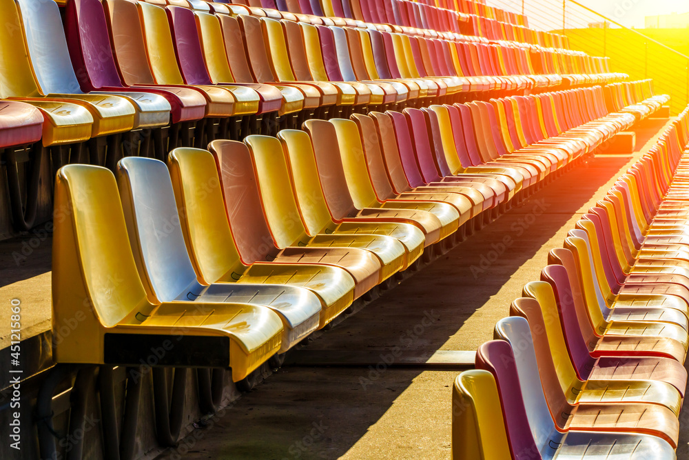 Obraz premium Empty plastic chairs in the stadium.