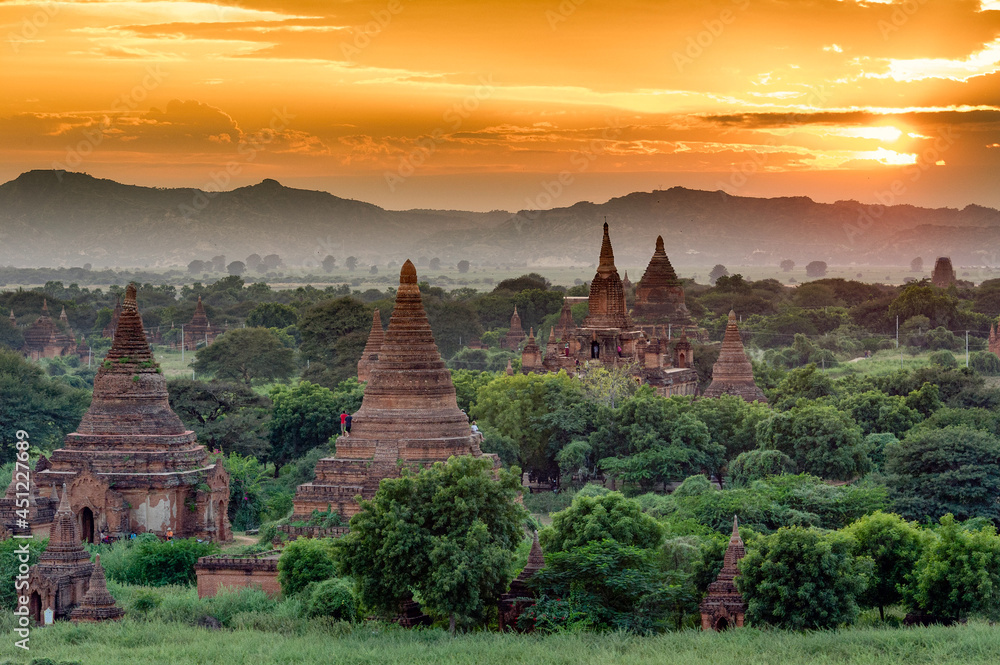 Myanmar (ex Birmanie). Bagan, Mandalay region. Sunset at the plain of Bagan with there temple
