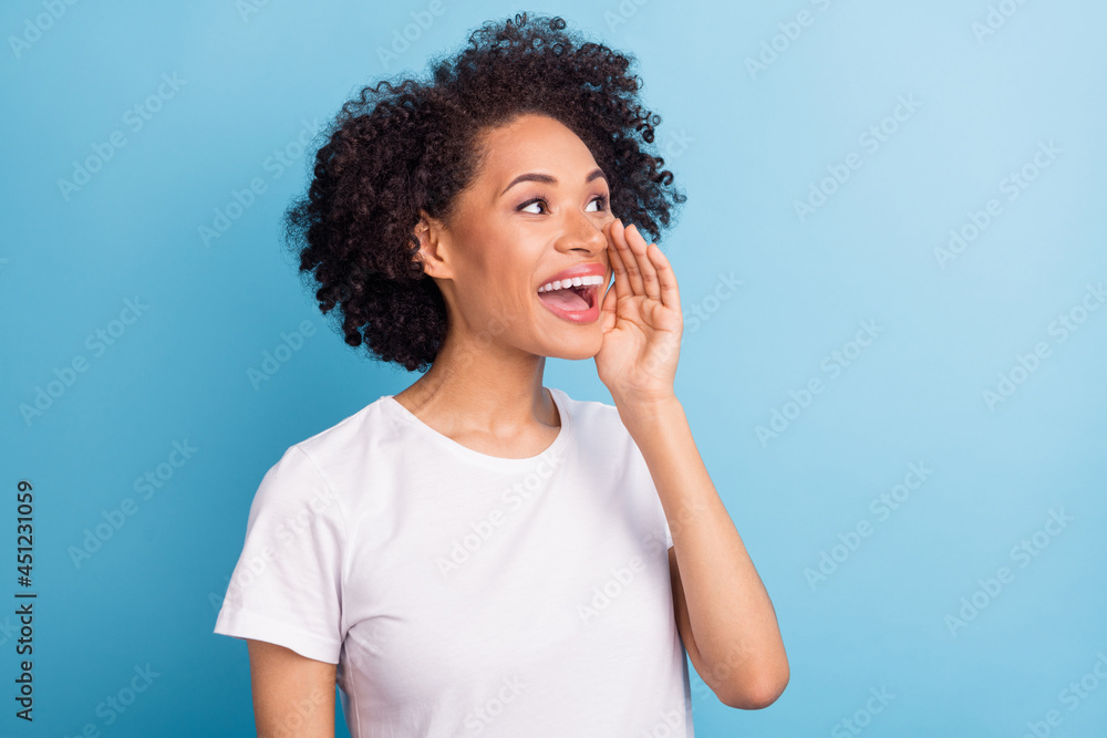 Portrait of attractive cheerful girl saying news ad copy space isolated over bright blue color background Portrait of attractive cheerful girl saying news ad copy space isolated over bright blue color background