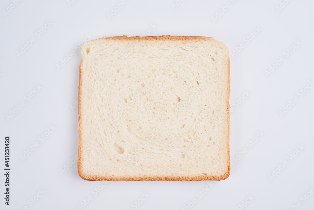 One square slice of toast sandwich bread isolated on white background close up