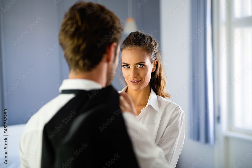 Loving couple having intimate moments in bedroom Loving couple having intimate moments in bedroom