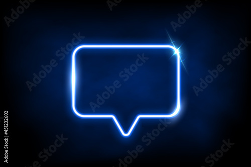 Glowing blue neon speech bubble sign. Electric light rectangle frame isolated on dark background with fog. Vector design element.