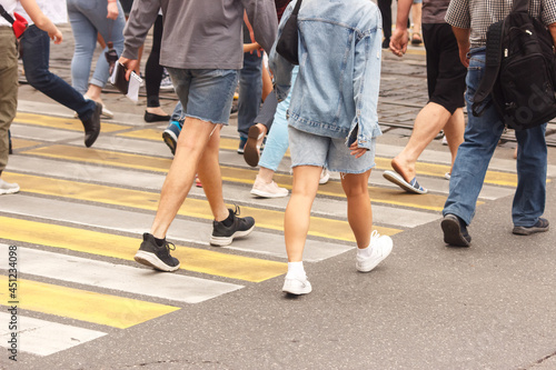 pedestrians walking on a crosswalk