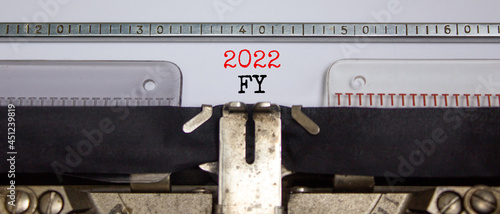 2022 FY fiscal New Year symbol. Words '2022 FY fiscal year' typed on retro typewriter. Business and 2022 FY fiscal New Year concept. Copy space.