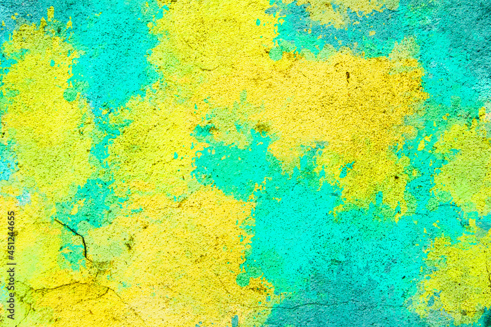 Multicolor grunge background texture, template for banners,  concrete wall. Yellow and blue splashes on the wall. 