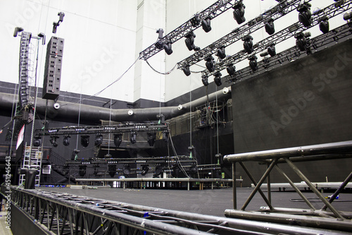 Installation of professional sound, light, video and stage equipment for a show. Technical preparing for the concert.