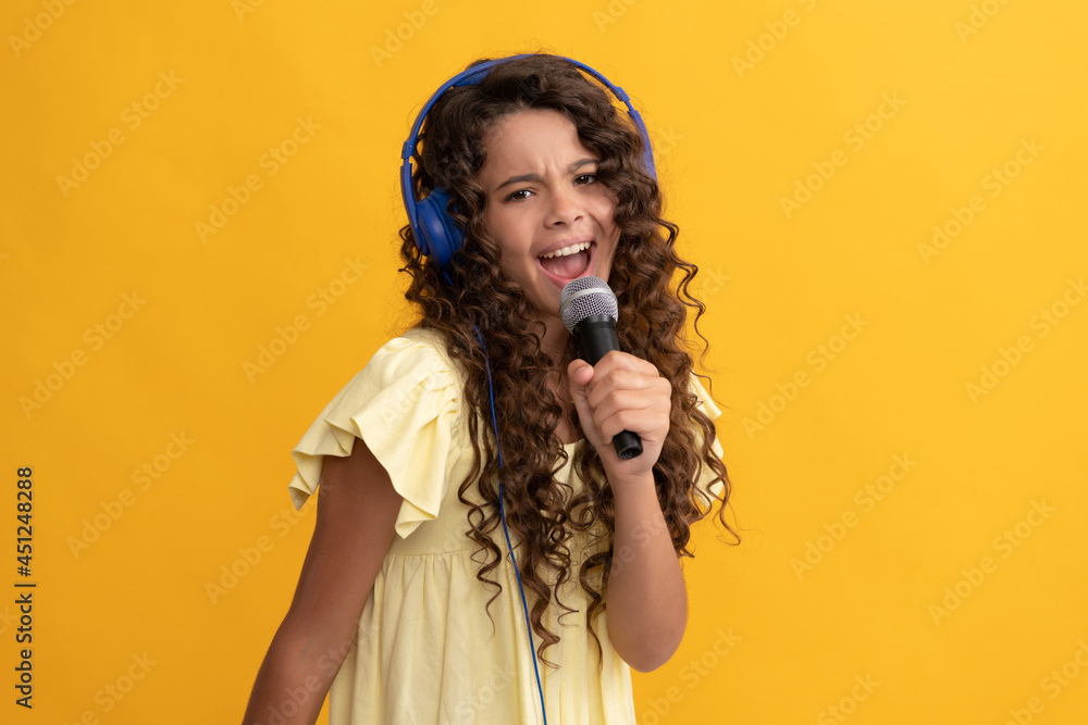 new technology. childhood development. child singer sing karaoke in microphone. new technology. childhood development. child singer sing karaoke in microphone.