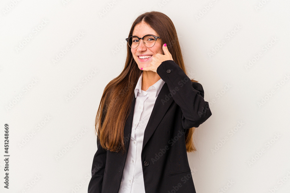 Young caucasian business woman isolated on white background showing a mobile phone call gesture with fingers. Young caucasian business woman isolated on white background showing a mobile phone call gesture with fingers.