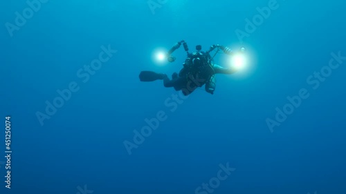 Wallpaper Mural Underwater photographer shots in the blue water. 4K - 60fps.  Mediterranean Sea, Cyprus  Torontodigital.ca