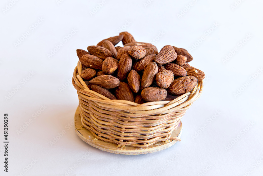 Almonds on white background. Healthy grains Almonds on white background. Healthy grains