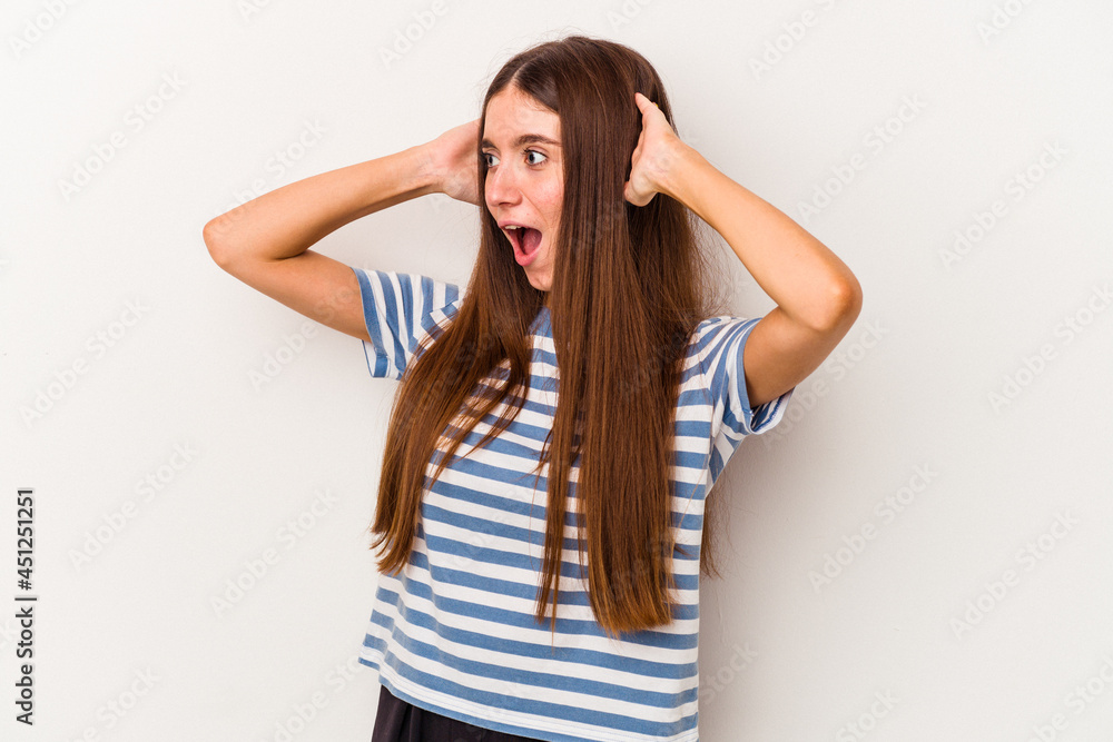 Young caucasian woman isolated on white background screaming, very excited, passionate, satisfied with something. Young caucasian woman isolated on white background screaming, very excited, passionate, satisfied with something.