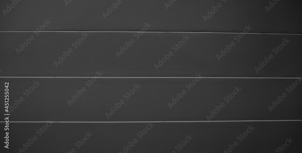 Black background stripes, texture, gray black, cement wall in front of the bathroom