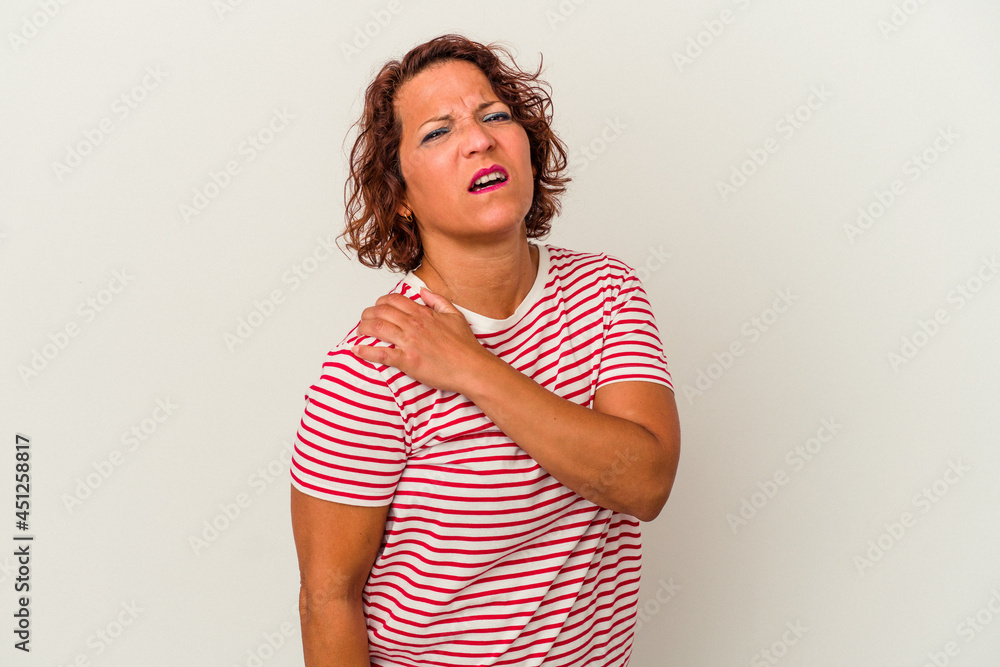 Middle age latin woman isolated on white background having a shoulder pain. Middle age latin woman isolated on white background having a shoulder pain.