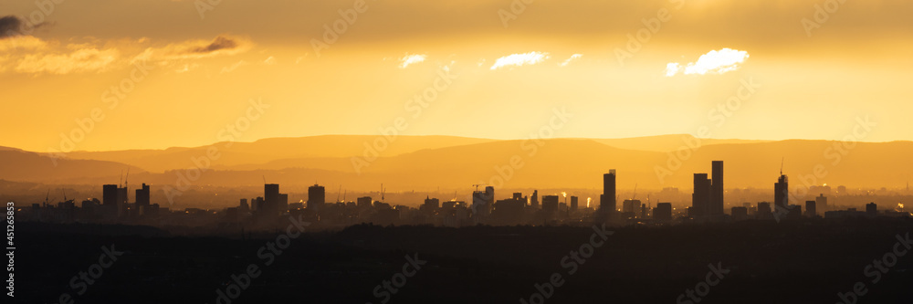 Sunrise over Manchester city, panoramic view of the city skyline, England, UK