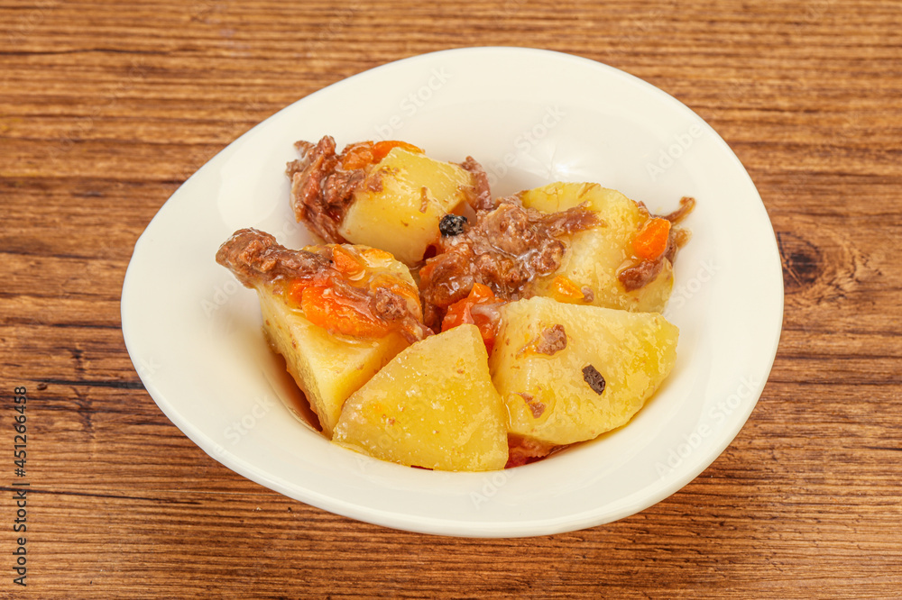 Roasted potato and beef with sauce Roasted potato and beef with sauce