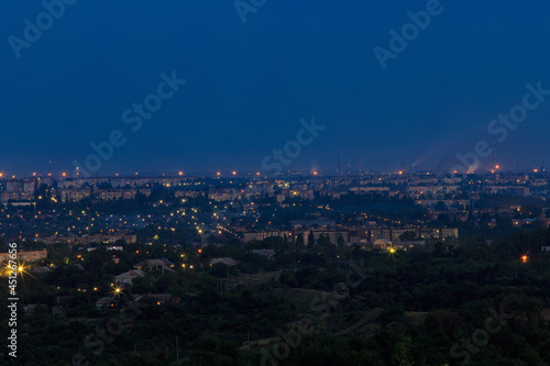 A bird's-eye view of the city at night. Bright lights of a big city in Eastern Europe