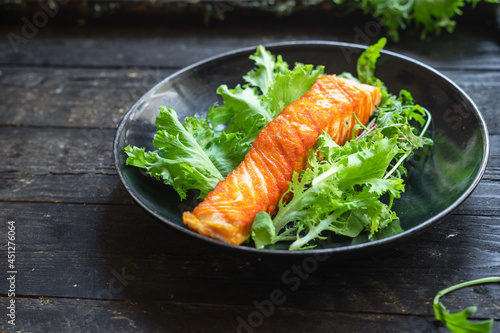 salmon fresh salad leaf fish grill seafood fried grilled snack meal on the table copy space food background keto or paleo diet veggie vegetarian food pescetarian diet