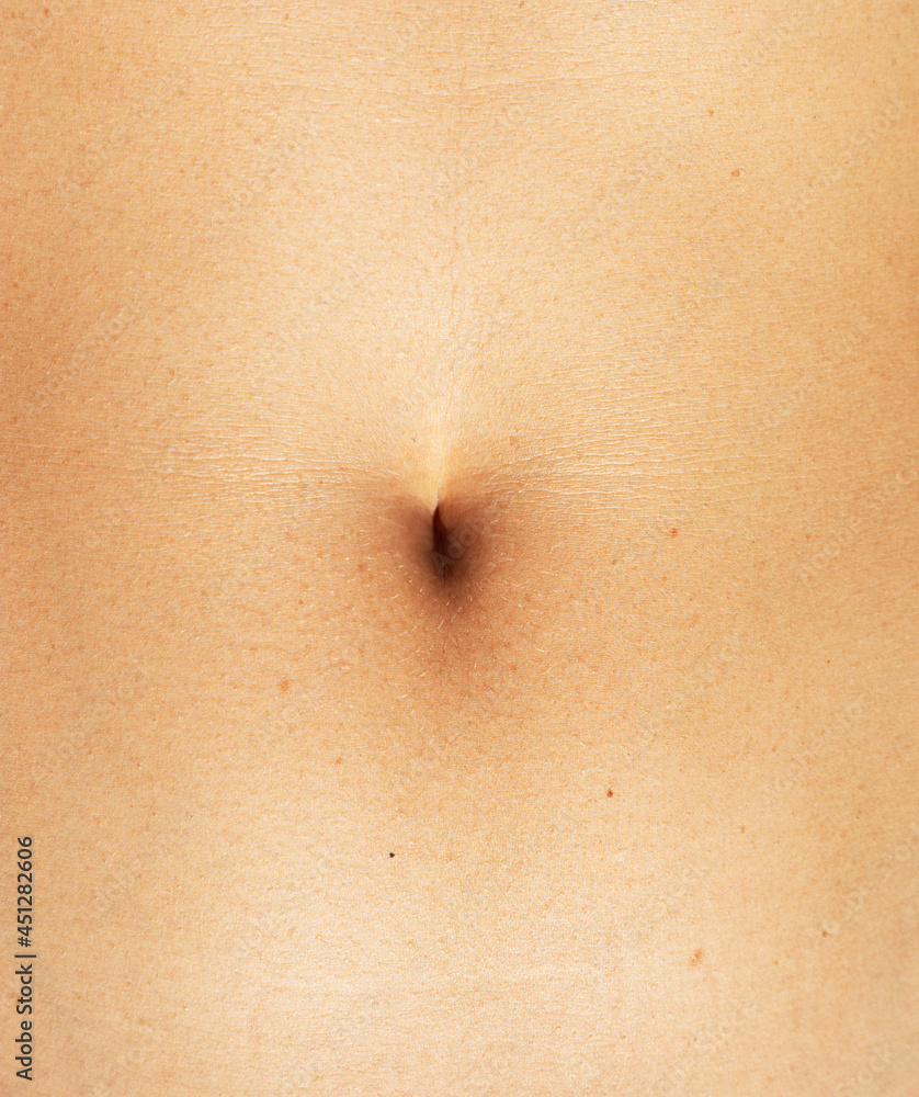 Fototapeta premium Beautiful navel of woman clothe-up