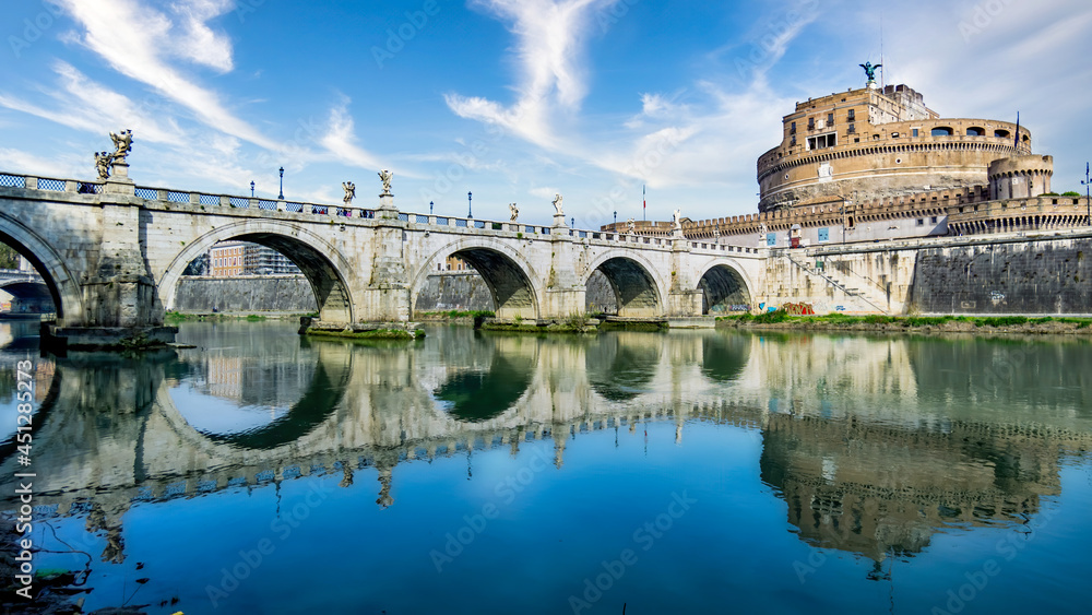 Rome, Italy - April 2017: Ponte Sant'Angelo bridge and Castel Sant Angelo built over Tiber river
