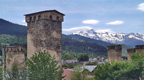 Svan towers and Caucasian mountains on backgrounds. Georgia. Svaneti
