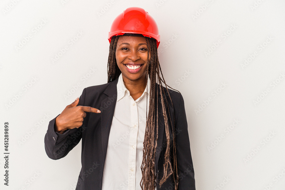 Young african american architect woman isolated on white background person pointing by hand to a shirt copy space, proud and confident