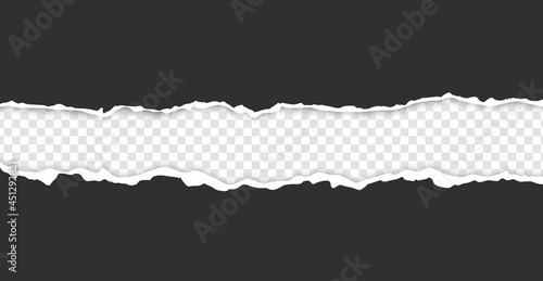 Torn, realistic, ripped strip of dark grey paper with a light shadow on a transparent background. Torn cardboard.
