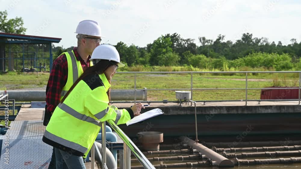 Environmental engineers work at wastewater treatment plants,Water supply engineering working at Water recycling plant for reuse,Technicians and engineers discuss work together.
Environmental engineers work at wastewater treatment plants,Water supply engineering working at Water recycling plant for reuse,Technicians and engineers discuss work together.