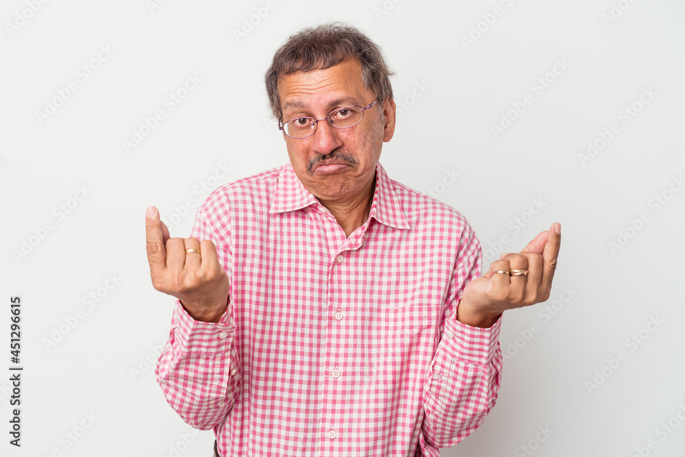 Middle aged indian man isolated on white background showing that she has no money. Middle aged indian man isolated on white background showing that she has no money.
