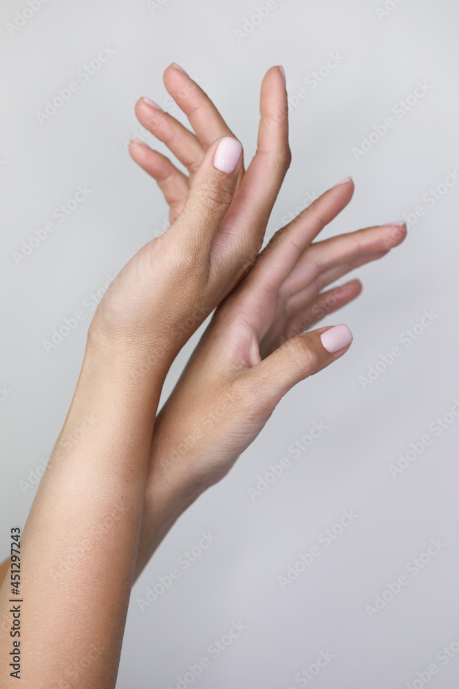 beautiful hands with manicured nude nails manicure. beautiful hands with manicured nude nails manicure.