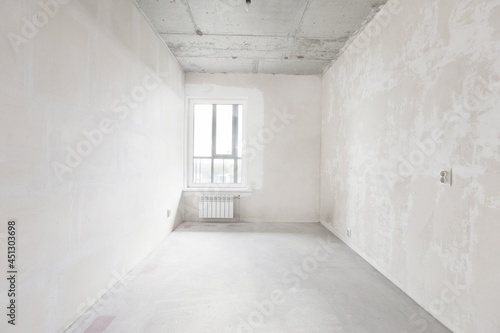 interior of the apartment without decoration in gray colors