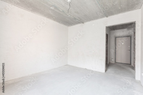 interior of the apartment without decoration in gray colors