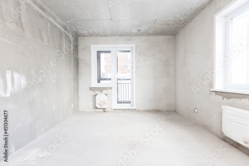 interior of the apartment without decoration in gray colors