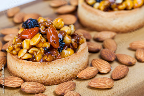 tartlets made of dough nuts and dried fruits