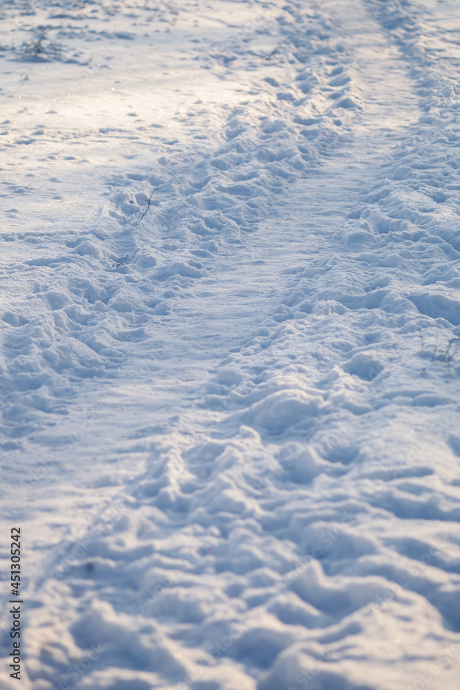 Winter snowy road through the fields Winter snowy road through the fields