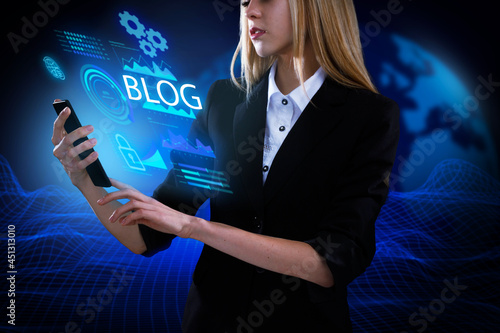 Business, Technology, Internet and network concept. Young businessman working on a virtual screen of the future and sees the inscription: Blog