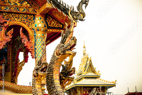 Naga is a mythological creature in Buddhism to be sculpted into a statue Decorate the stairs, doors and roofs of temples. It is beautiful and awe-inspiring. This photo was taken at Wat Nam Khrok, Nan 