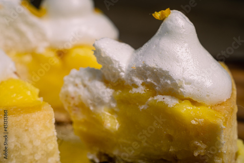 closeup of lemon pie with lemon peels