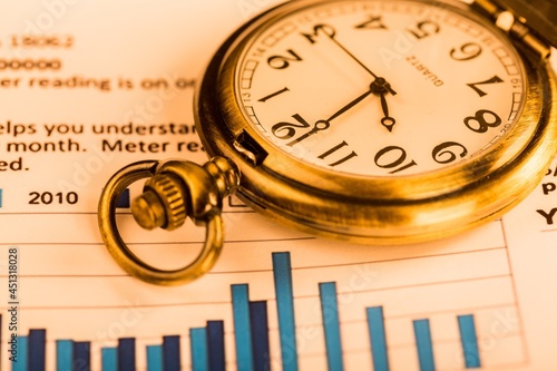 Pocket Watch on Business Graphs and Charts