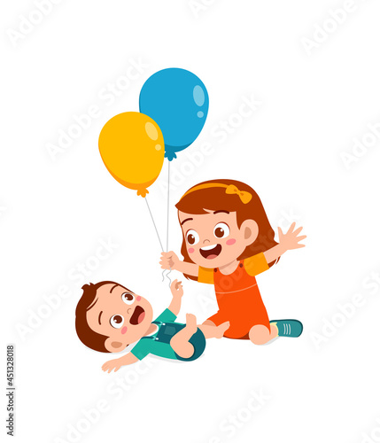 cute little girl play balloon with baby sibling