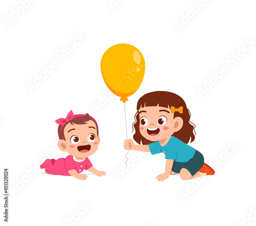 cute little girl play balloon with baby sibling