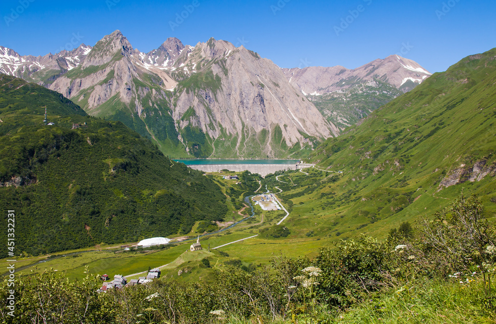 Fototapeta premium Aerial view of Riale alpine village and Morasco lake in Val Formazza, Piemonte, Italy