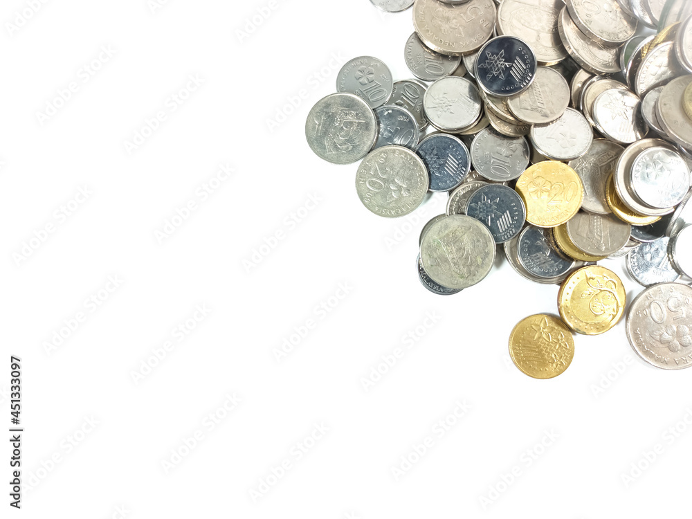 Business and Saving concept. Scattered coins isolated on white background with copy and text space. Business and Saving concept. Scattered coins isolated on white background with copy and text space.