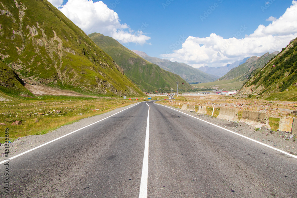 Fototapeta premium Highway and road landscape and view in Khazbegi, Georgia
